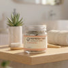 A clear glass jar of REFRESH TABS Strawberry toothpaste tablets sits on a light wood bathroom shelf, styled with a toothbrush, a small potted succulent, and a rolled towel in a bright, softly blurred bathroom setting, Refresh Tabs Strawberry toothpaste tablets, Australian-made fruity toothpaste available in fluoride and fluoride-free options. Enjoy a delicious strawberry flavour, convenient everyday brushing and a more sustainable oral care routine with an alternative to traditional toothpaste tubes.
